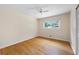 Bedroom features hardwood floors, ceiling fan and a window for natural light at 2315 Tuxedo Se Dr, Marietta, GA 30067
