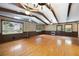 Spacious living room featuring hardwood floors, beamed ceiling and lots of light at 2315 Tuxedo Se Dr, Marietta, GA 30067