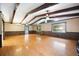 Spacious living room featuring hardwood floors, beamed ceiling and lots of light at 2315 Tuxedo Se Dr, Marietta, GA 30067