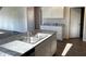 Bright kitchen features a granite-topped island and sleek stainless steel appliances at 2701 Montie Ct, Lithia Springs, GA 30122