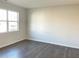 Spacious and well-lit living room area, showcasing the hardwood flooring and natural light at 2701 Montie Ct, Lithia Springs, GA 30122