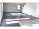 Bright and airy living room with hardwood floors and lots of natural light at 2701 Montie Ct, Lithia Springs, GA 30122