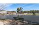 Scenic view of a well-maintained pond with fountain and bench seating in a recreational area on a sunny day at 2701 Montie Ct, Lithia Springs, GA 30122