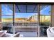 View from the balcony showing nearby buildings, trees, and the sky at 661 Auburn Ne Ave # 10, Atlanta, GA 30312
