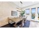 Bright dining room with large windows, stylish lighting, and a cozy atmosphere at 661 Auburn Ne Ave # 10, Atlanta, GA 30312