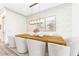 Elegant dining room features a wood table, stylish seating, and modern lighting fixture at 661 Auburn Ne Ave # 10, Atlanta, GA 30312