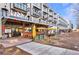 Multi-story building with street level dining and modern architectural design in urban area at 661 Auburn Ne Ave # 10, Atlanta, GA 30312