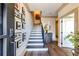 Welcoming foyer features hardwood floors, staircase, and curated photo gallery at 661 Auburn Ne Ave # 10, Atlanta, GA 30312