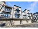 Modern townhome garages and upper level balconies; attractive exterior architecture and design at 661 Auburn Ne Ave # 10, Atlanta, GA 30312