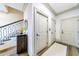 Hallway with hardwood floors, staircase, and convenient closet doors at 661 Auburn Ne Ave # 10, Atlanta, GA 30312