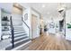 Inviting hallway leading to an open kitchen and dining area with staircase at 661 Auburn Ne Ave # 10, Atlanta, GA 30312