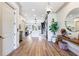 Hallway with hardwood floors leads to the kitchen and dining room at 661 Auburn Ne Ave # 10, Atlanta, GA 30312
