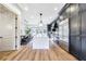 Spacious kitchen with a large island, stainless steel appliances, and hardwood floors at 661 Auburn Ne Ave # 10, Atlanta, GA 30312