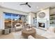 Cozy living room features a fireplace, plush seating, and a balcony with a view at 661 Auburn Ne Ave # 10, Atlanta, GA 30312