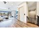 Bright living room with large windows, hardwood floors, and an elevator access point at 661 Auburn Ne Ave # 10, Atlanta, GA 30312