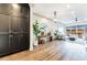 Open-concept living room with hardwood floors, built-in cabinets, and a comfortable seating area at 661 Auburn Ne Ave # 10, Atlanta, GA 30312