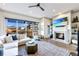 Cozy living room with a fireplace, modern furniture, and a view of the balcony at 661 Auburn Ne Ave # 10, Atlanta, GA 30312