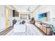 Inviting living room with modern furnishings, hardwood floors, and a bright, airy atmosphere with beach view on tv at 661 Auburn Ne Ave # 10, Atlanta, GA 30312