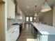 Modern kitchen featuring white cabinets, stainless steel appliances, and a large island at 1429 Hazy Way # 309, Atlanta, GA 30315