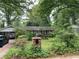 An exterior front elevation of the home, showing the front yard and brick mailbox at 1481 Pine St, Stone Mountain, GA 30087