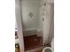 Tiled walk-in shower featuring a built-in bench and decorative accents at 1481 Pine St, Stone Mountain, GA 30087