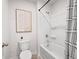 A well-lit bathroom with a shower and toilet at 2709 Montie Ct, Lithia Springs, GA 30122