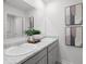 A modern bathroom with dual sinks and stylish decor at 2709 Montie Ct, Lithia Springs, GA 30122