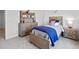 A bedroom with wood-look furniture and playful decorations at 2709 Montie Ct, Lithia Springs, GA 30122