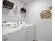 A functional laundry room with modern appliances at 2709 Montie Ct, Lithia Springs, GA 30122