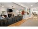 Basement featuring wood floors, a stone fireplace, neutral paint and seating at 2870 Redding Ne Rd, Atlanta, GA 30319