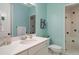 Charming bathroom features an updated sink, light blue walls, and tiled shower at 2870 Redding Ne Rd, Atlanta, GA 30319
