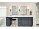 Elegant bathroom with dual vanities, marble floors, modern lighting, and a luxurious atmosphere at 2870 Redding Ne Rd, Atlanta, GA 30319