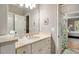 Bright bathroom with dual vanity, marble countertop, and modern fixtures at 2870 Redding Ne Rd, Atlanta, GA 30319
