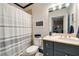 Bathroom featuring a vanity with drawers, toilet, and shower with shower curtain at 2870 Redding Ne Rd, Atlanta, GA 30319
