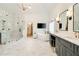 Modern bathroom featuring marble floors, a soaking tub, a glass shower, and updated fixtures at 2870 Redding Ne Rd, Atlanta, GA 30319