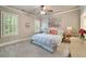 Cozy bedroom with a comfortable bed, neutral decor, and ample natural light at 2870 Redding Ne Rd, Atlanta, GA 30319