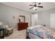 Comfortable bedroom features soft carpet, ceiling fan, and neutral colors at 2870 Redding Ne Rd, Atlanta, GA 30319