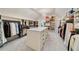 Spacious walk-in closet featuring custom shelving, storage drawers, and decorative lighting at 2870 Redding Ne Rd, Atlanta, GA 30319