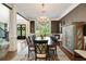 Dining room with chandelier, hardwood floors, and a decorative cabinet at 2870 Redding Ne Rd, Atlanta, GA 30319