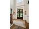 Elegant foyer features hardwood floors, wainscoting, and double front doors at 2870 Redding Ne Rd, Atlanta, GA 30319