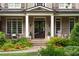 Close-up of a welcoming front porch with brickwork and classic details at 2870 Redding Ne Rd, Atlanta, GA 30319