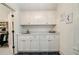 Laundry room with white cabinetry, a marble countertop, and a sink at 2870 Redding Ne Rd, Atlanta, GA 30319