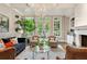 Bright living room with coffered ceilings, fireplace, and French doors at 2870 Redding Ne Rd, Atlanta, GA 30319