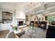 Inviting living room with fireplace, built-in shelving, and comfortable seating arrangements at 2870 Redding Ne Rd, Atlanta, GA 30319