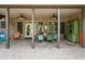 Inviting covered patio with brickwork, comfortable seating, and charming decor for outdoor entertainment at 2870 Redding Ne Rd, Atlanta, GA 30319