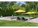 Stunning backyard view featuring a sparkling pool, a relaxing hot tub, and comfortable lounge seating at 2870 Redding Ne Rd, Atlanta, GA 30319