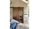 The custom-built storage with sliding barn door and organization, maximizing space and adding rustic charm to the area at 2870 Redding Ne Rd, Atlanta, GA 30319