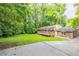 Expansive backyard with deck offers ample space for outdoor activities and relaxation at 4201 Hicks Rd, Austell, GA 30106