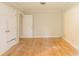Bedroom with hardwood floors and closet doors at 4201 Hicks Rd, Austell, GA 30106