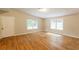 Spacious room with light-filled windows and hardwood floors at 4201 Hicks Rd, Austell, GA 30106